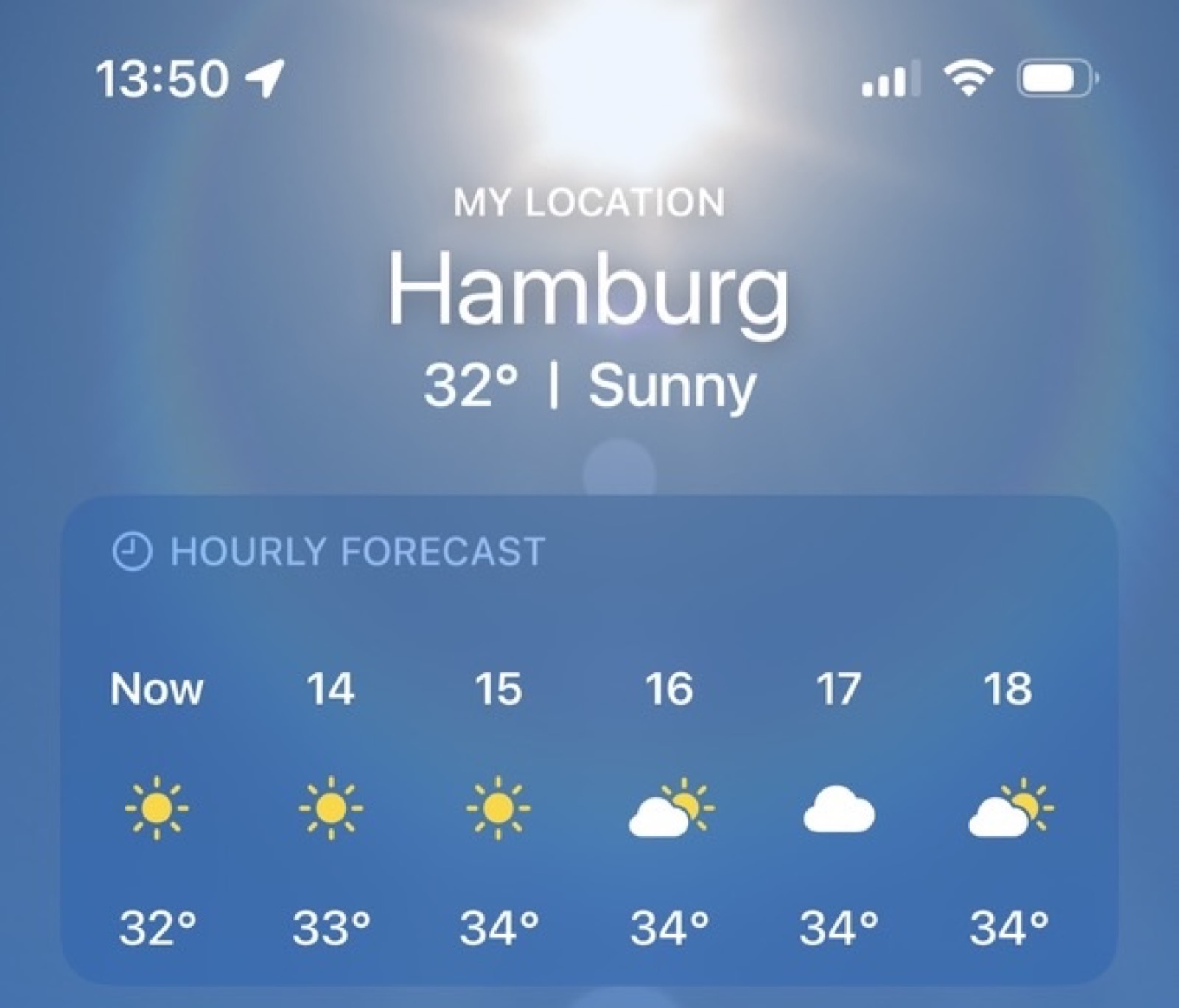 Print do app de clima mostrando Hamburgo a 32 graus e ensolarado